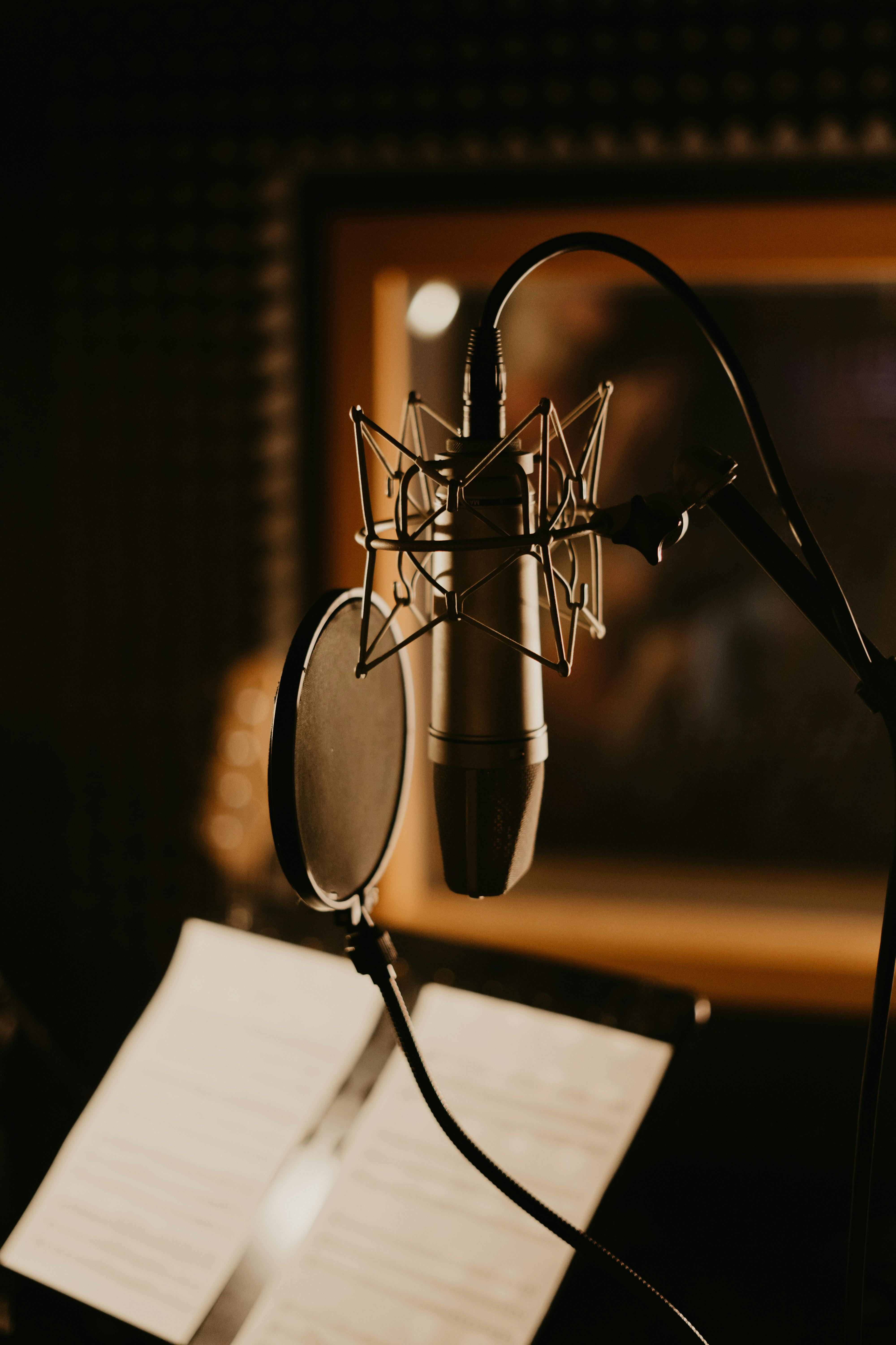 Home vocal studio setup with mic, pop filter, and recording setup